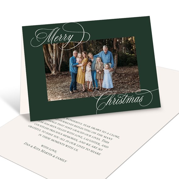 dark green card with photo area and white script text