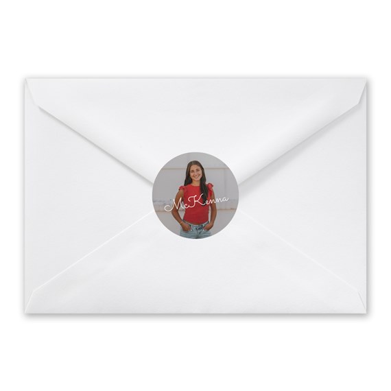 white envelope with circular photo placeholder and script text