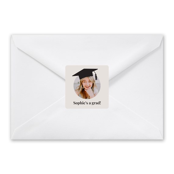 white envelope with photo placeholder and graduation seal
