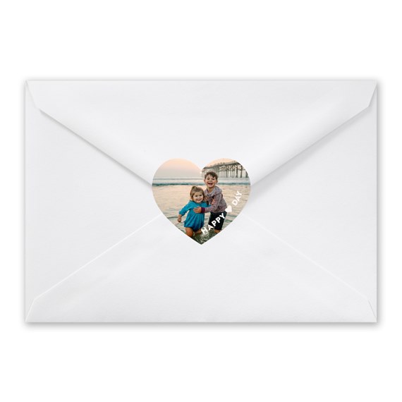 white envelope with heart photo area and text
