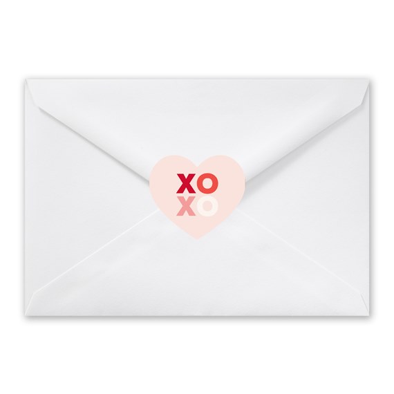 white envelope with heart and XO design