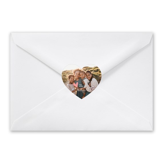 white envelope with heart photo placeholder and text