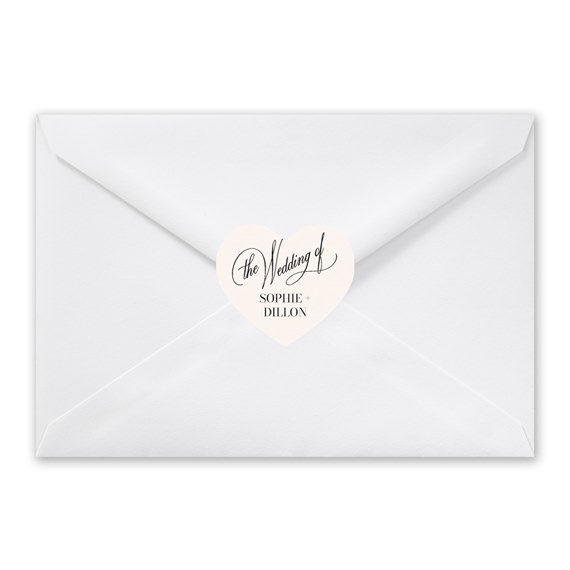 white envelope with heart-shaped calligraphy seal