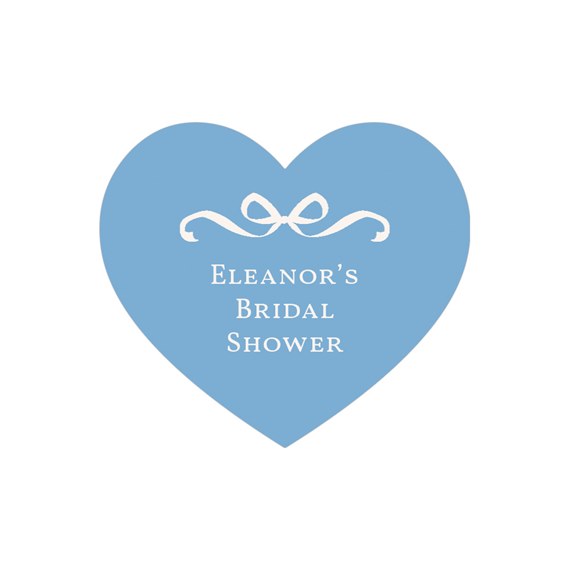 heart-shaped envelope seal with bow and text