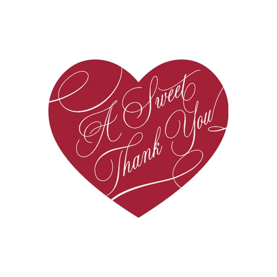 heart-shaped sticker with text