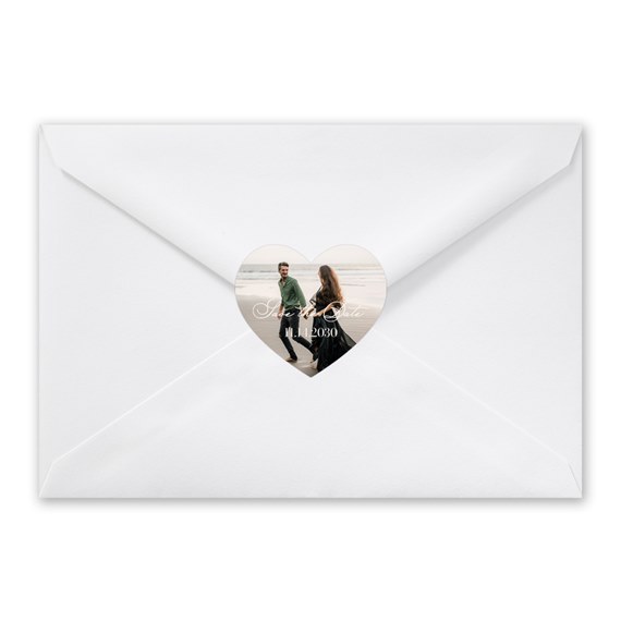 white envelope with heart photo placeholder and decorative text