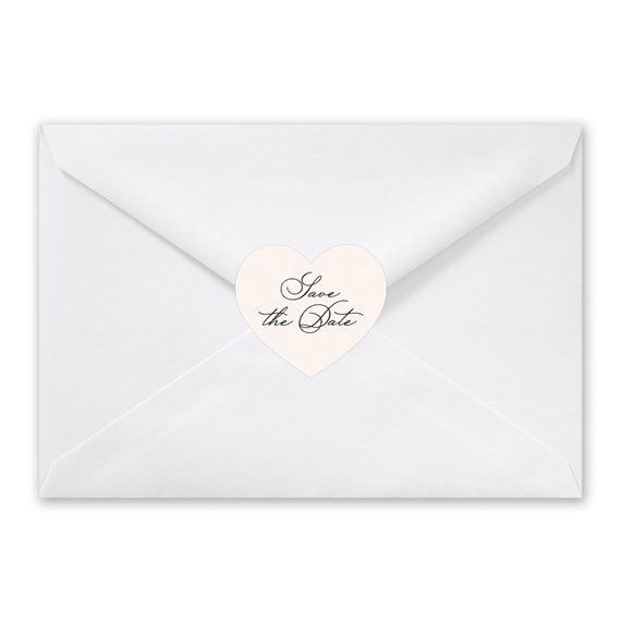 white envelope with heart-shaped seal and text