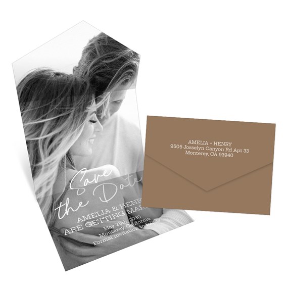 save the date card with photo placeholder and brown envelope