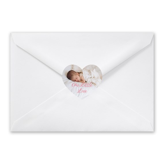 heart-shaped photo placeholder with text