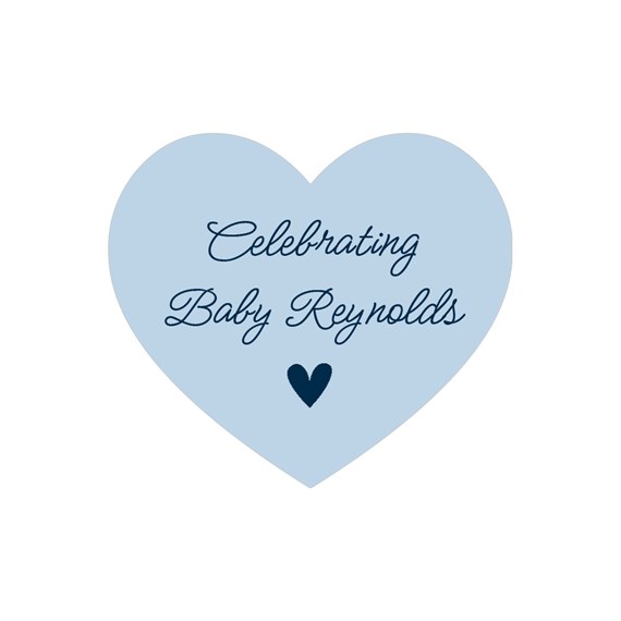 heart-shaped sticker with text