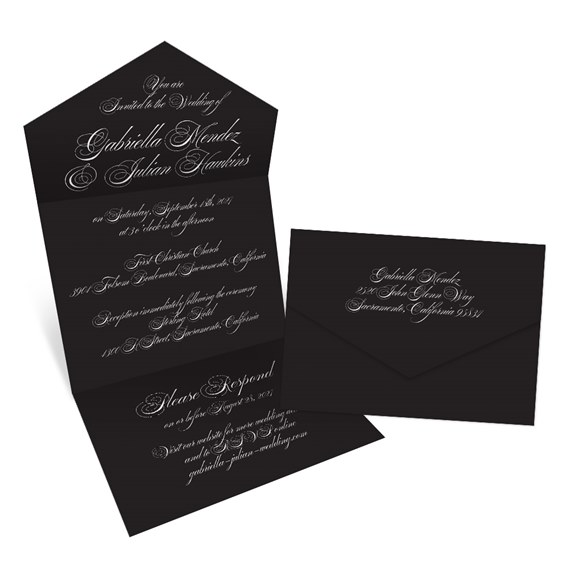 black wedding invitation with white text and envelope