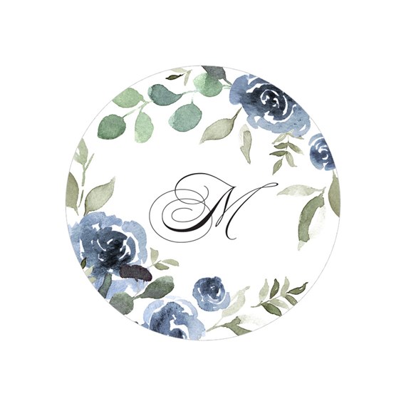 circular envelope seal with floral design and letter M