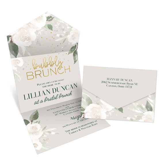 floral bridal shower invitation with gold text and matching envelope