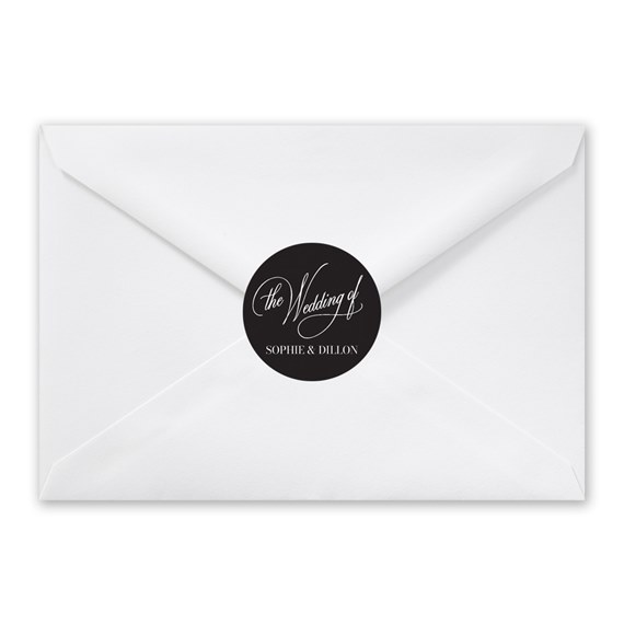 white envelope with black circular seal and script text