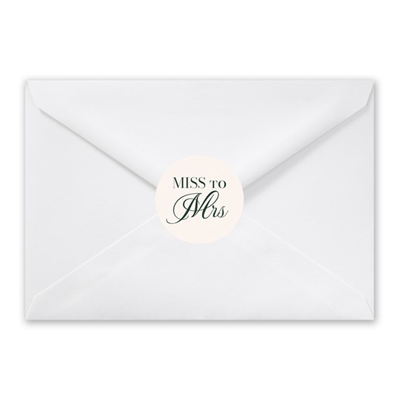 white envelope with circular seal reading 'MISS to Mrs'