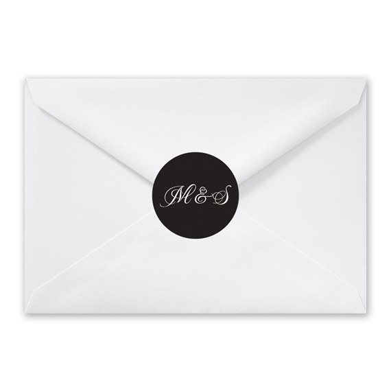 white envelope with black seal and script text