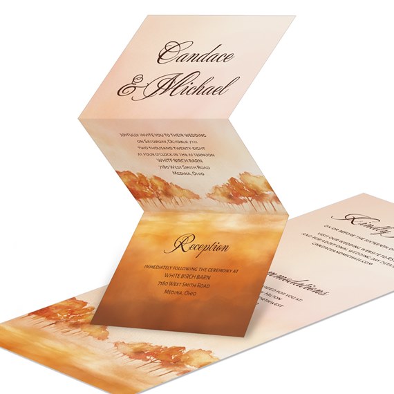 tri-fold invitation with watercolor design and script text