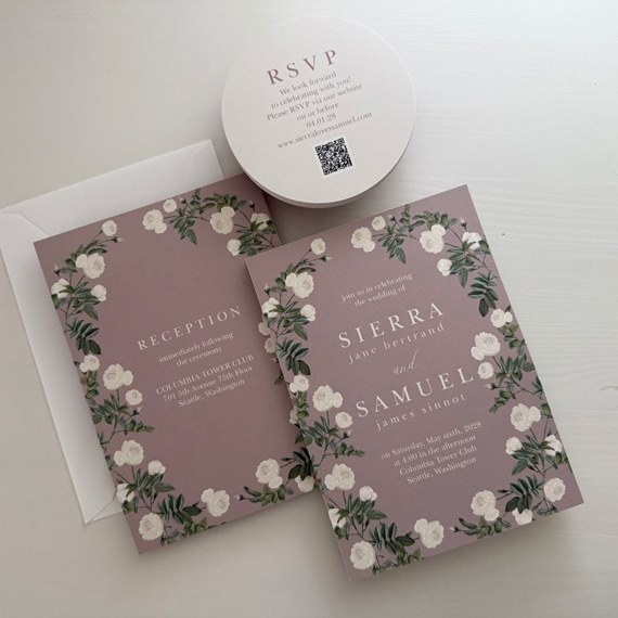 floral wedding invitation with white roses and mauve background