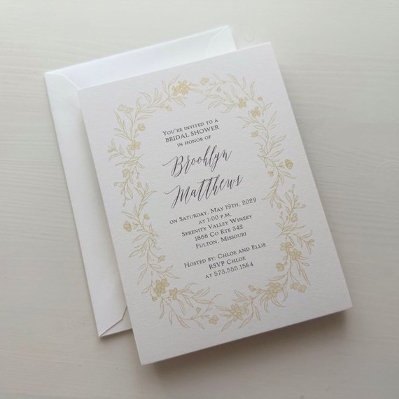 bridal shower invitation with floral frame and customizable text area