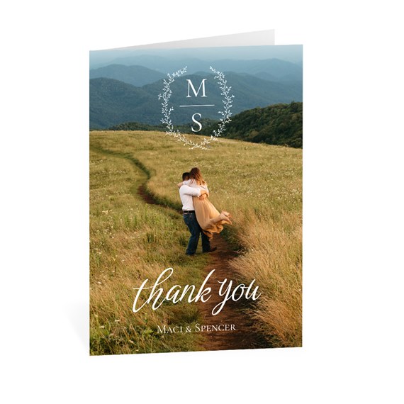 thank you card with floral monogram and couple photo area