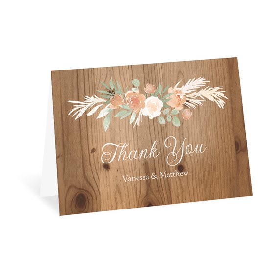 thank you card with floral design and wood background