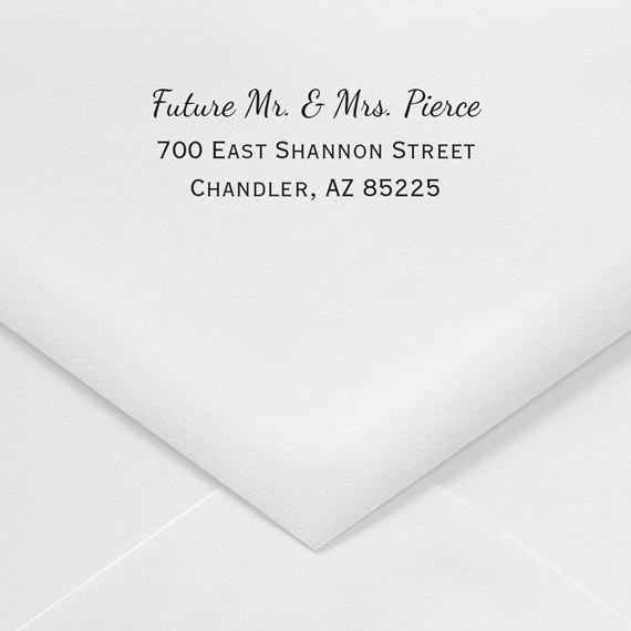 white envelope with printed address and names