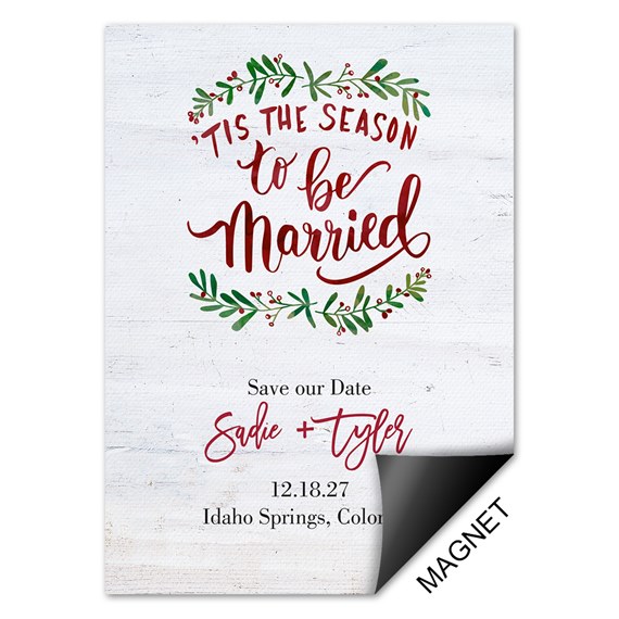 holiday save the date magnet with greenery and red text