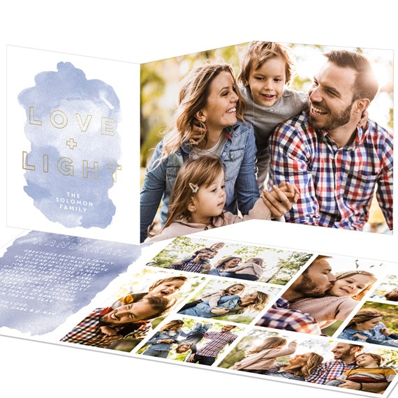 trifold Hanukkah card with photo placeholders and gold text