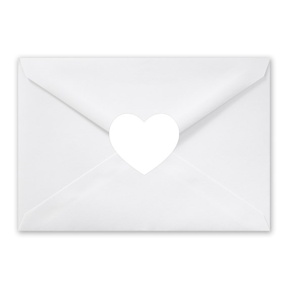 white envelope with heart cutout